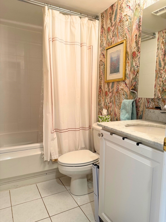 540 East Broadway, Unit 5A Boston, MA 02127 - Photo 11 of 17 a bathroom with a sink a toilet and shower