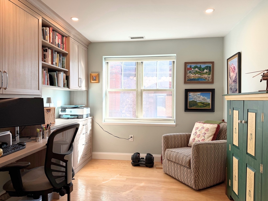 540 East Broadway, Unit 5A Boston, MA 02127 - Photo 10 of 17 a living room with furniture workspace and a window