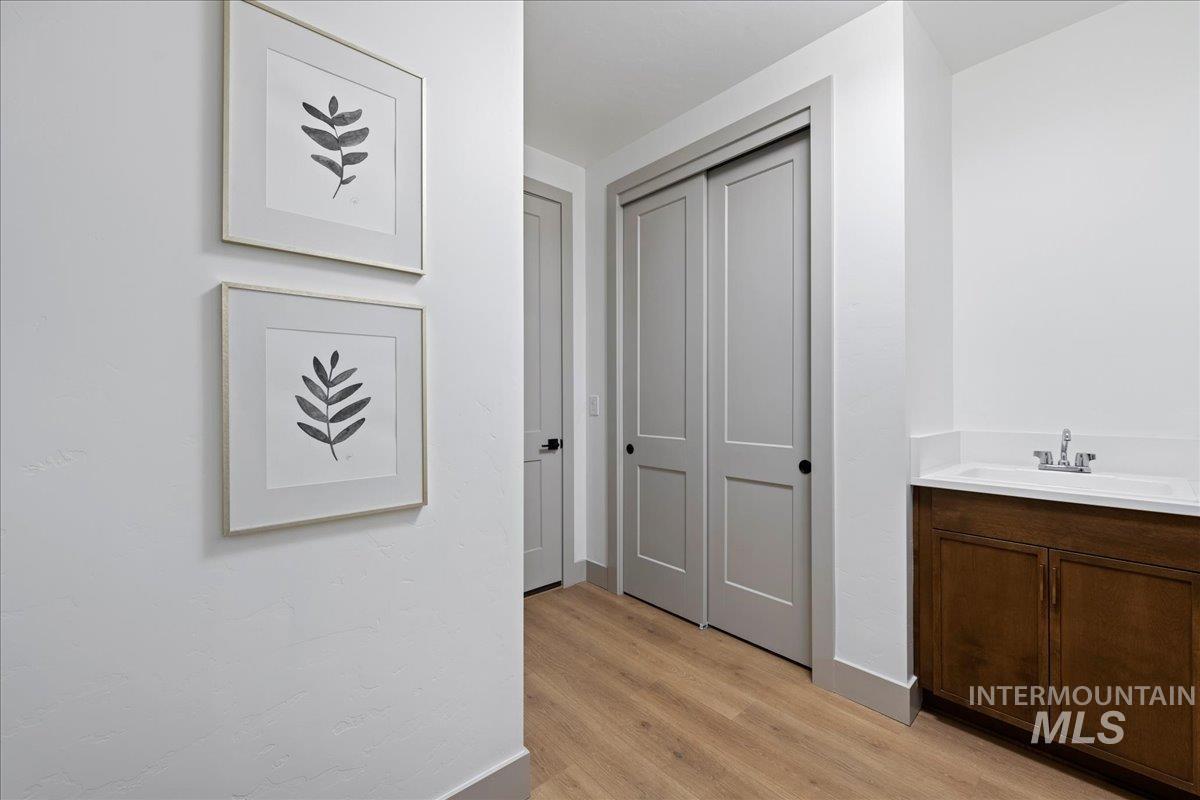 967 West Malbar Street Meridian, ID 83646 - Photo 27 of 33 Hall with light wood-type flooring and baseboards