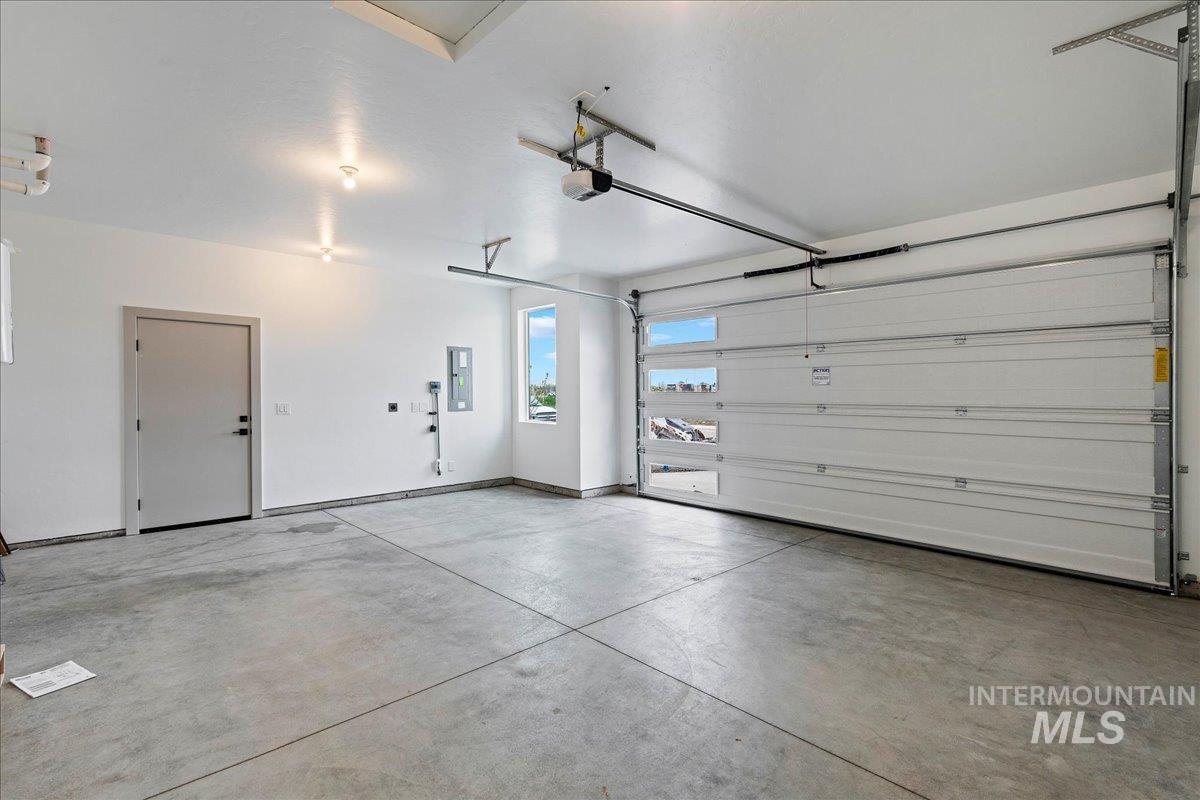 967 West Malbar Street Meridian, ID 83646 - Photo 28 of 33 Garage with electric panel and baseboards