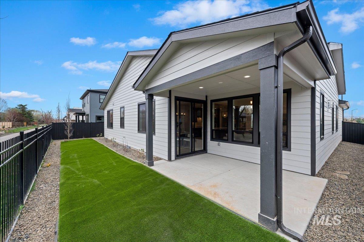 967 West Malbar Street Meridian, ID 83646 - Photo 31 of 33 Rear view of property with a patio area and a fenced backyard