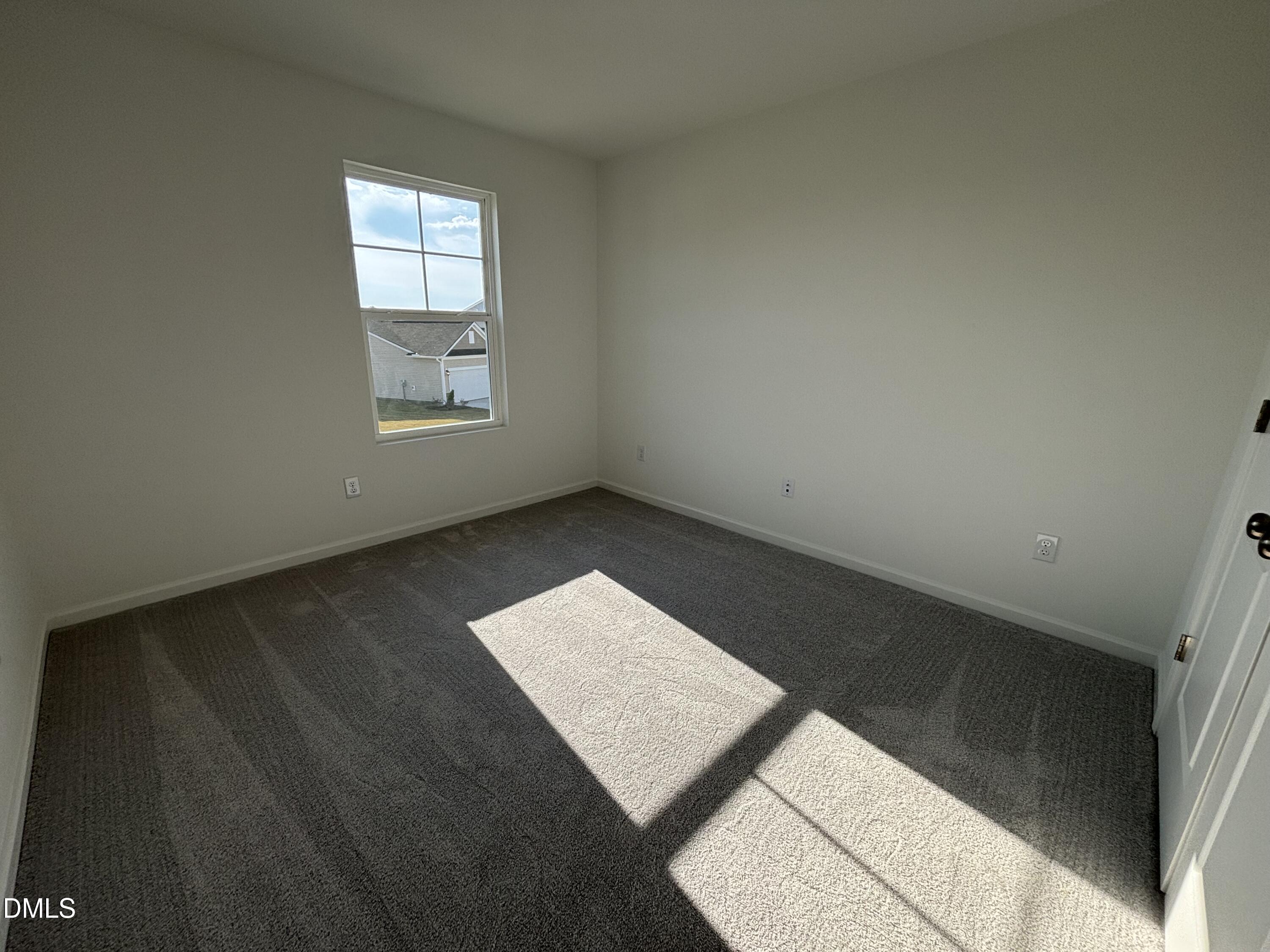 142 Blossom Fld Way Angier, NC 27501 - Photo 14 of 45 an empty room with a window