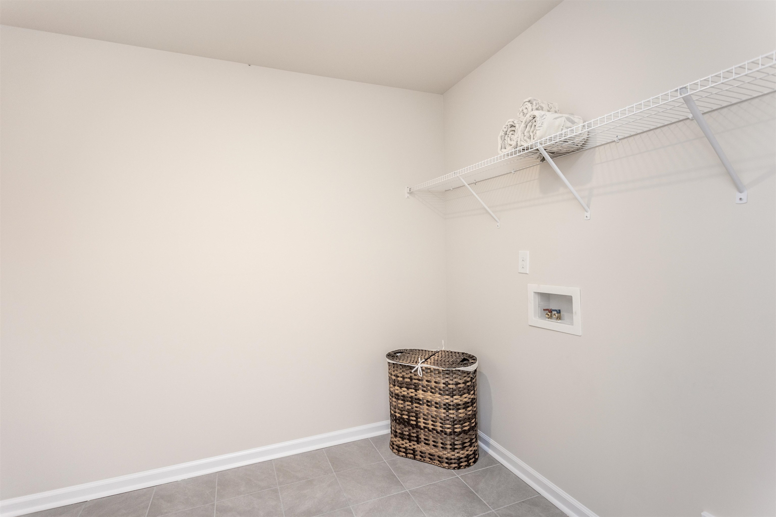 5602 Preveza Place Raleigh, NC 27603 - Photo 15 of 21 an empty room with a fan