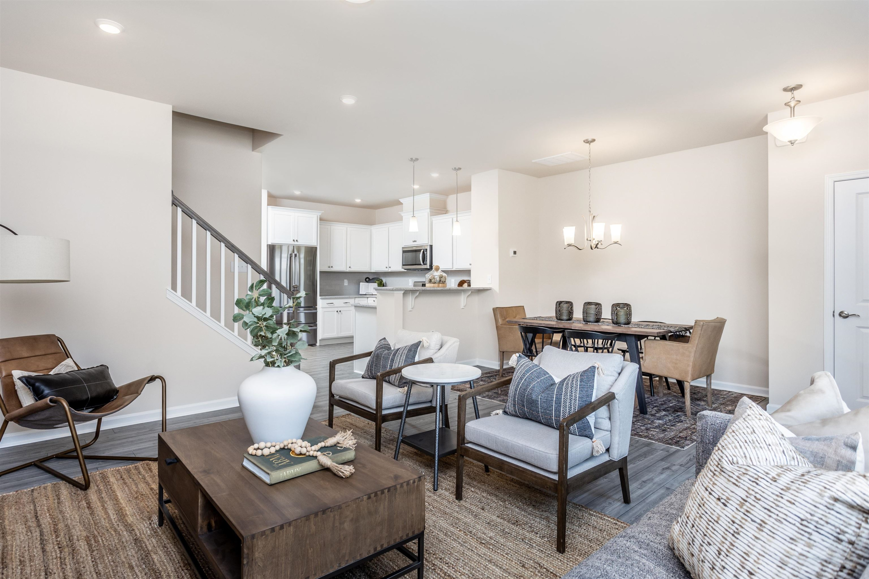 5602 Preveza Place Raleigh, NC 27603 - Photo 5 of 21 a living room with furniture and kitchen view