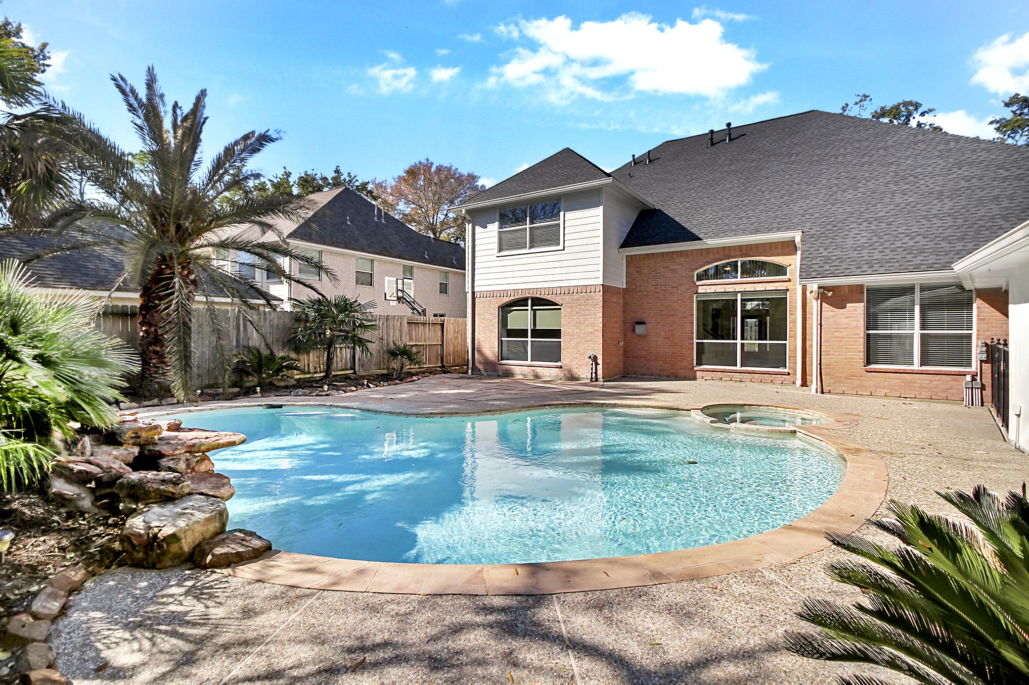 803 Chisel Point Drive Houston, TX 77094 - Photo 3 of 36 Sparkling pool with hot tub & huge patio area.