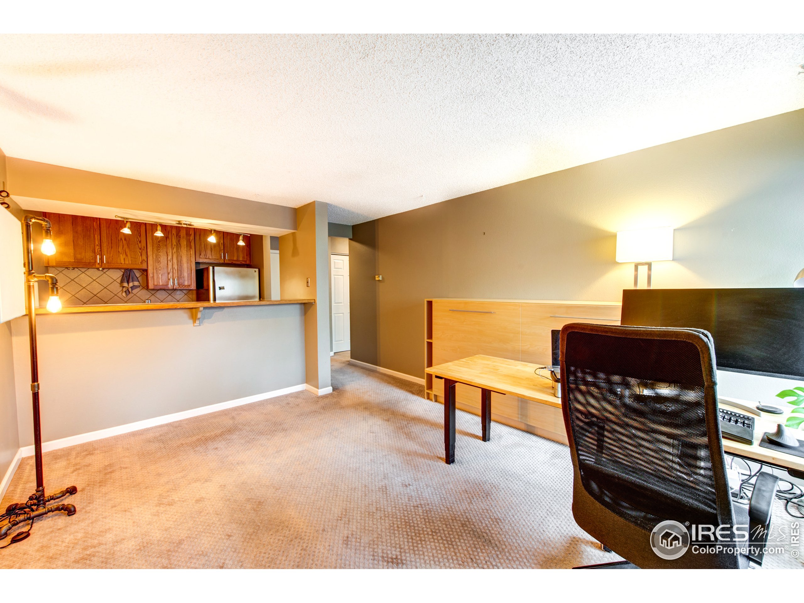 2707 Valmont Road, Unit B207 Boulder, CO 80304 - Photo 6 of 29 a view of a living room with furniture