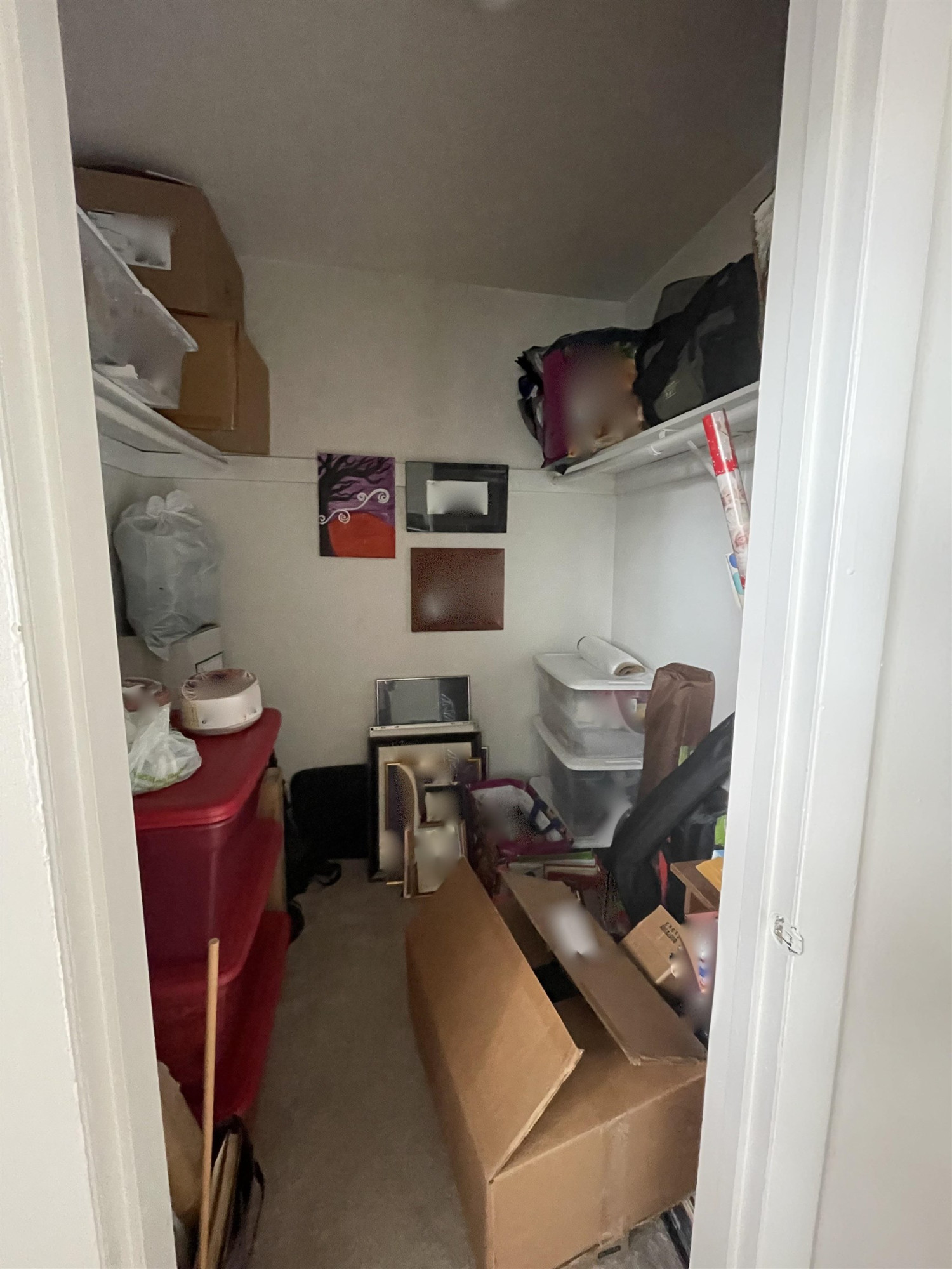 1010 Sandlin Place, Unit H Raleigh, NC 27606 - Photo 13 of 15 a work room with furniture and gym equipment