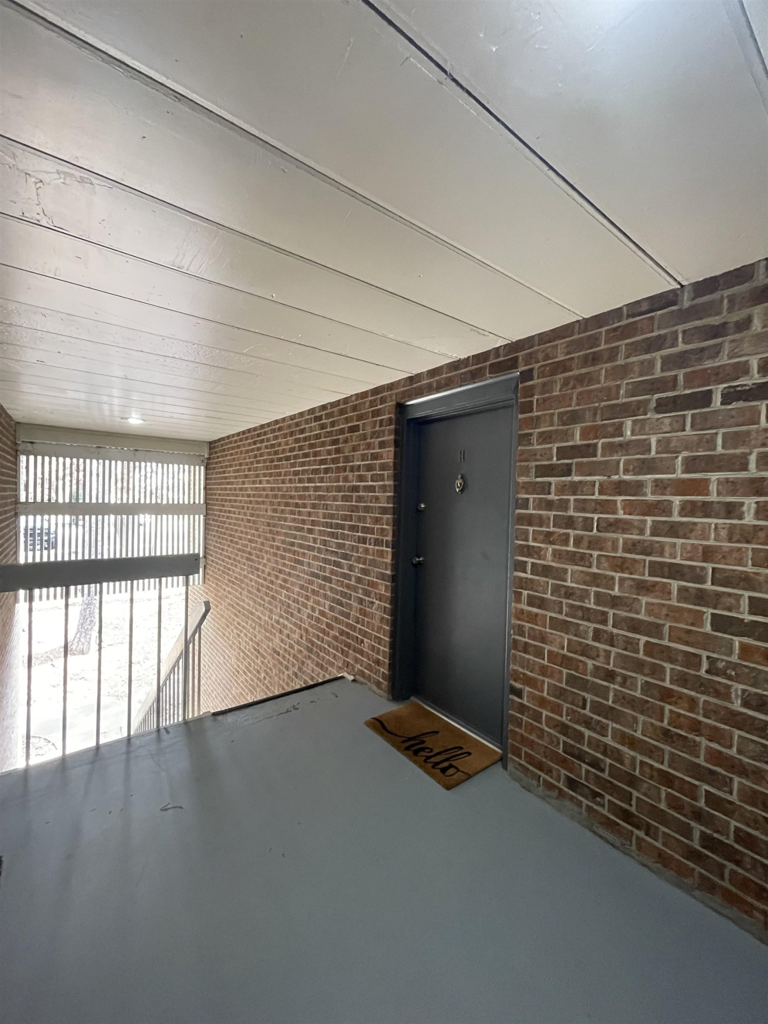 1010 Sandlin Place, Unit H Raleigh, NC 27606 - Photo 15 of 15 a view of an empty room with a window