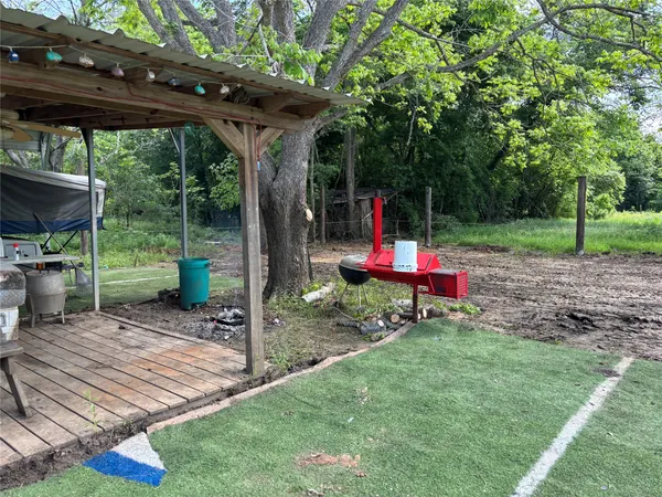 a garden view with a seating space