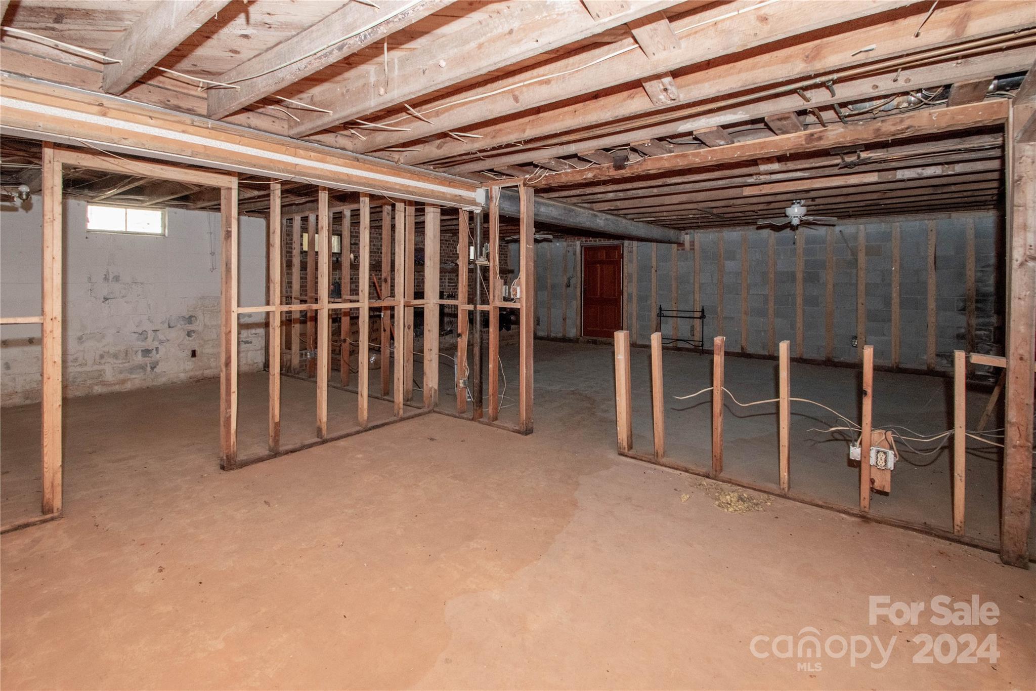 1516 Pleasant Plains Road Matthews, NC 28105 - Photo 23 of 29 a view of empty room with wooden walls