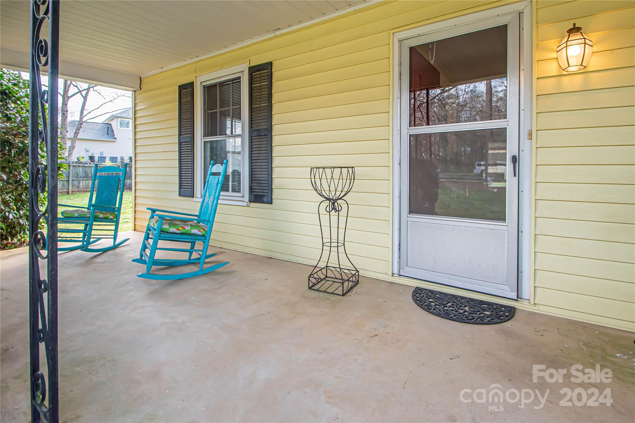 1516 Pleasant Plains Road Matthews, NC 28105 - Photo 3 of 29 an empty room with floor to ceiling windows