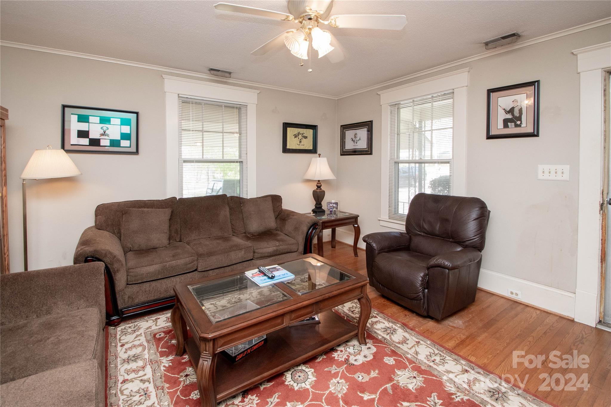 1516 Pleasant Plains Road Matthews, NC 28105 - Photo 6 of 29 a living room with furniture a bed and a window