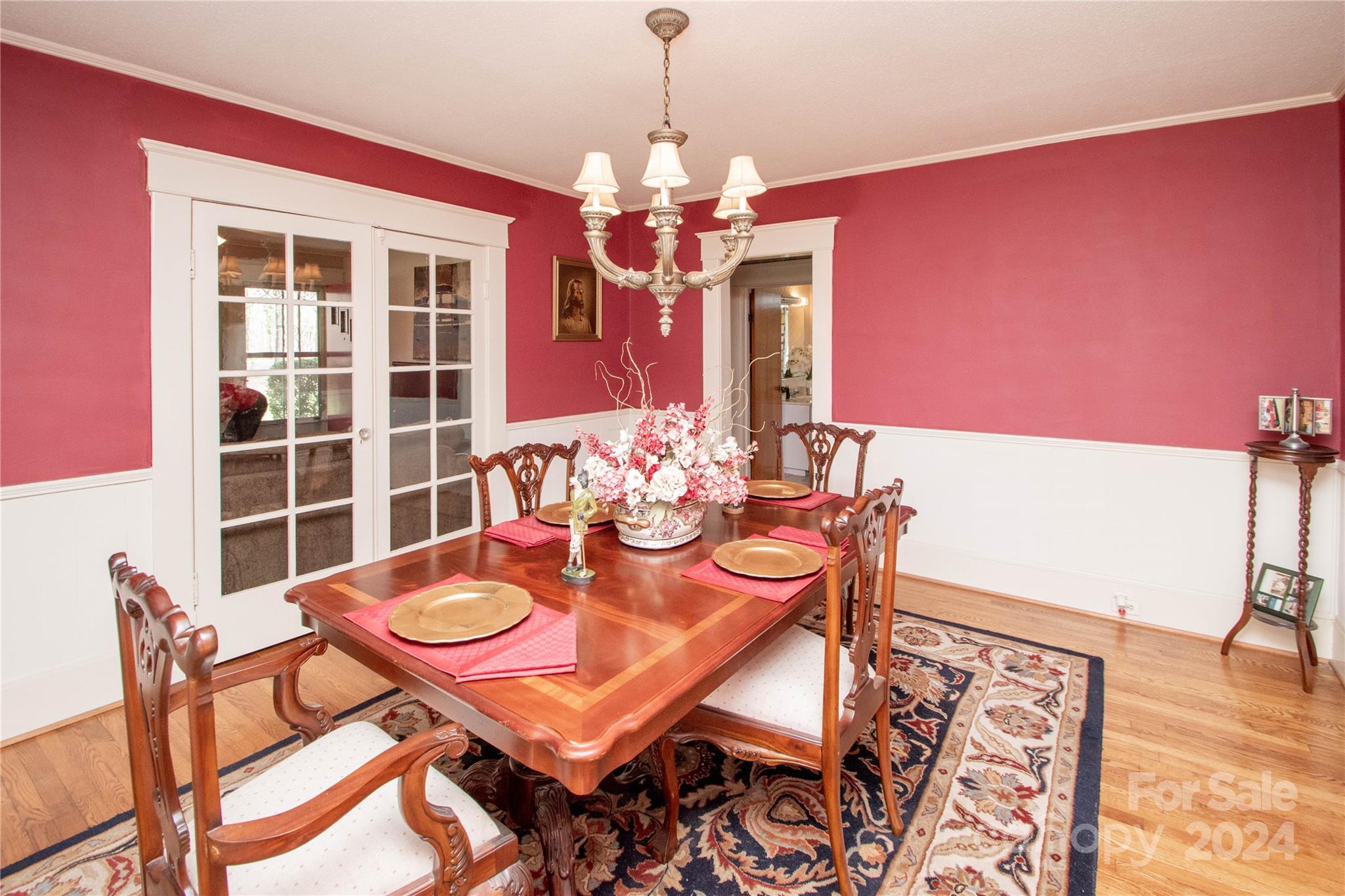1516 Pleasant Plains Road Matthews, NC 28105 - Photo 7 of 29 a view of a dining room with furniture and wooden floor