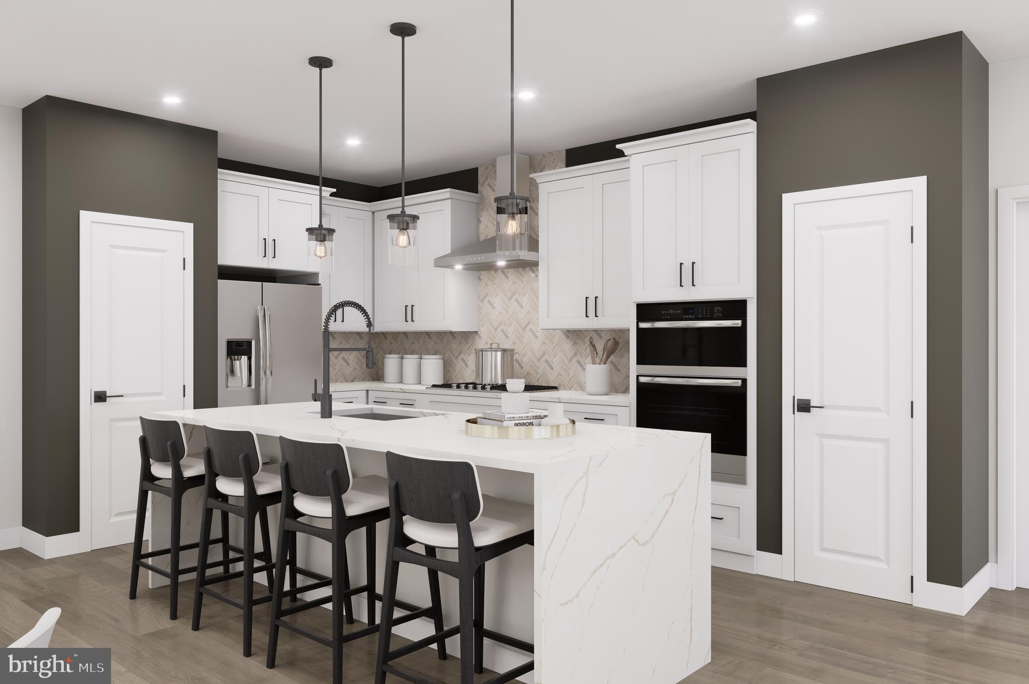 1121 Fortune Terrace, Unit 6 Potomac, MD 20854 - Photo 2 of 12 a kitchen with stainless steel appliances kitchen island granite countertop a table chairs and a refrigerator