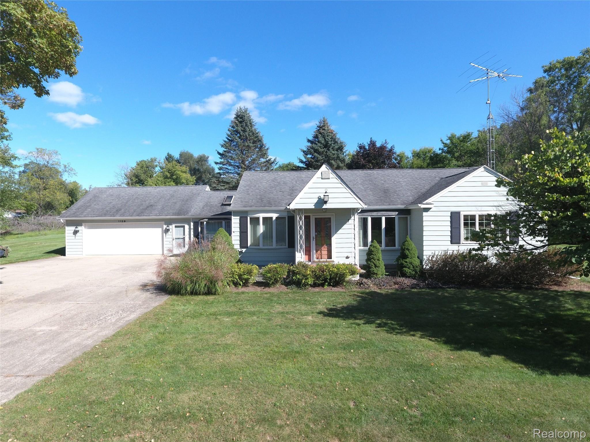1129 Adams Road Burton, MI 48509 - Photo 1 of 28 DJI_0011.JPG