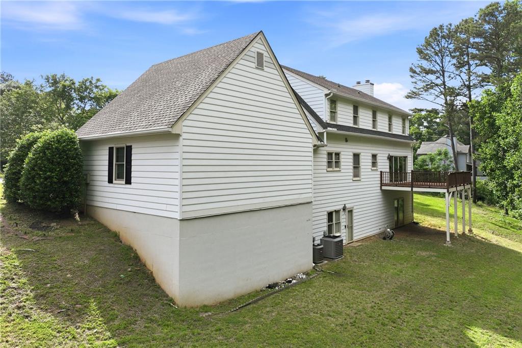 3608 Maple Forge Lane Gainesville, GA 30504 - Photo 42 of 45 a view of a house with a yard