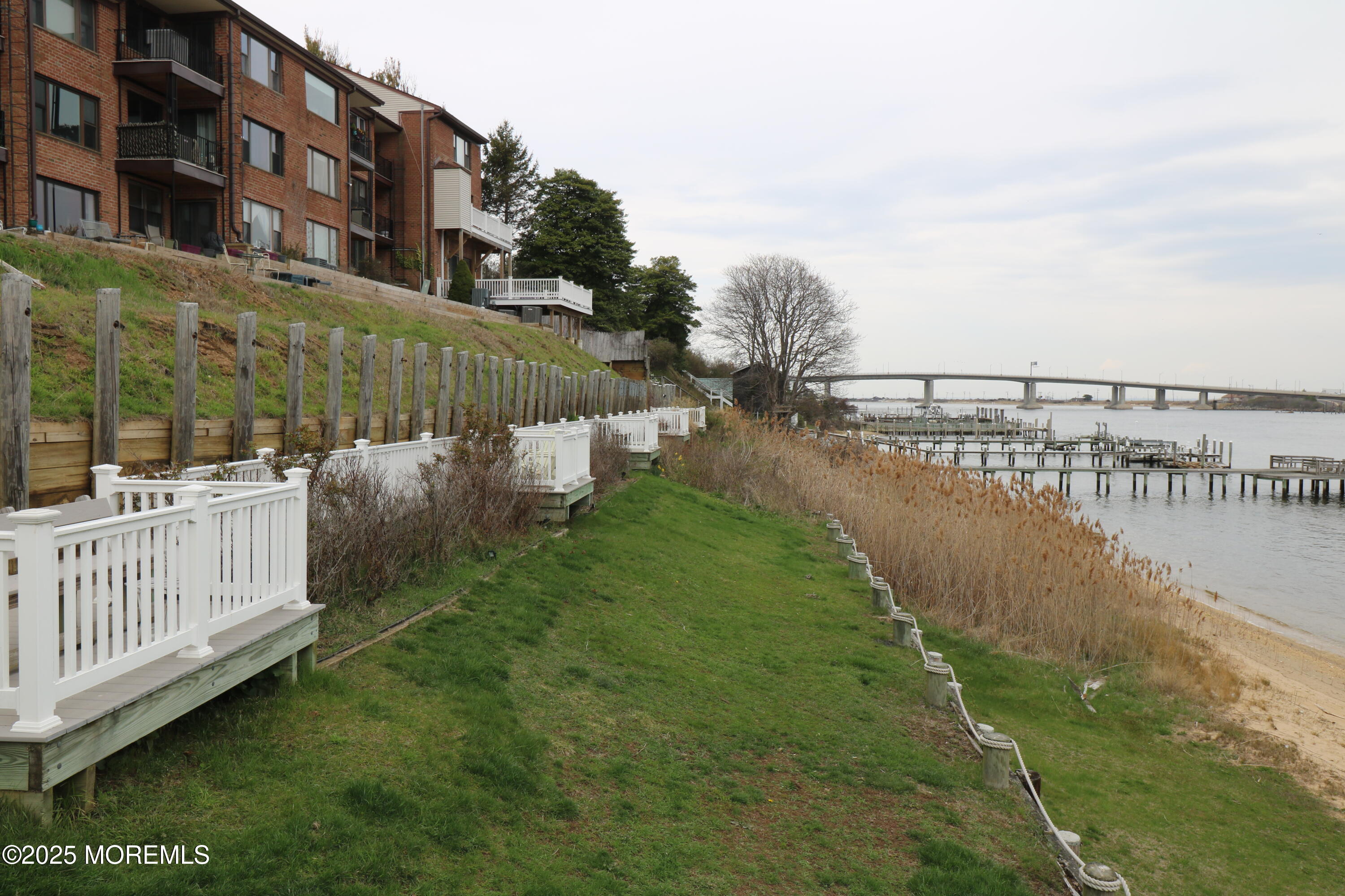 200 Portland Road, Unit E23 Highlands, NJ 07732 - Photo 29 of 33 a view of a city from a lake