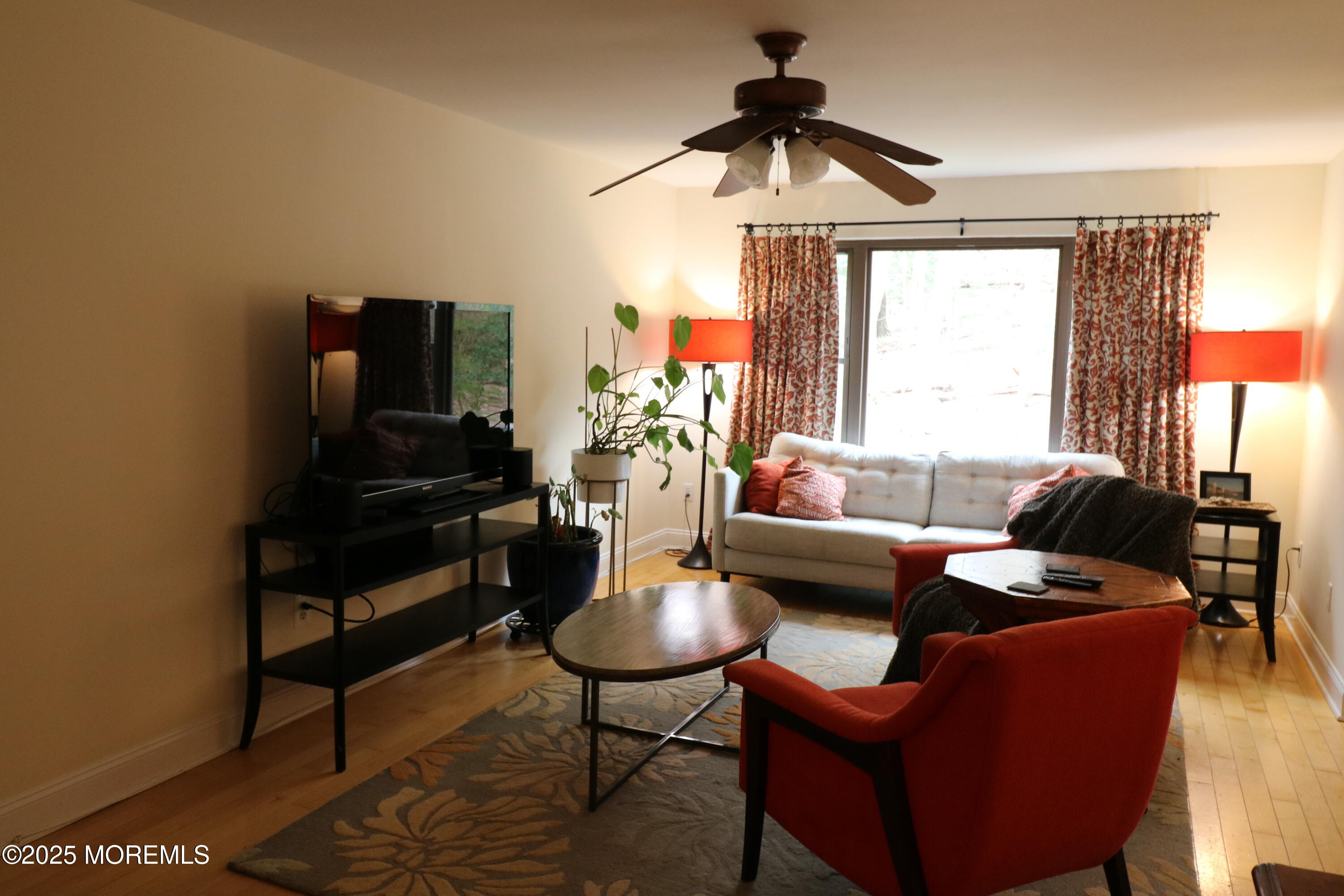 200 Portland Road, Unit E23 Highlands, NJ 07732 - Photo 6 of 33 a living room with furniture fireplace and a large window