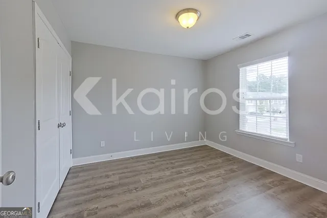 an empty room with windows