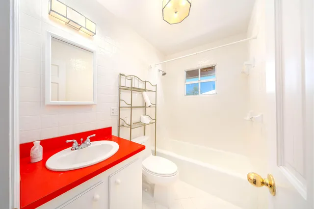 a view of a bathroom with utility room