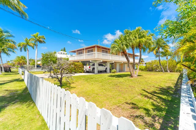 a view of a room with wooden walls