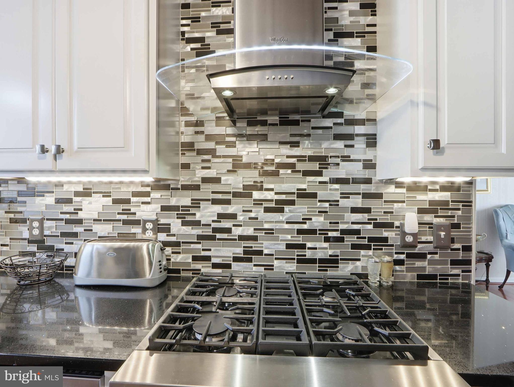 6715 Alter Street Baltimore, MD 21207 - Photo 16 of 47 Under mount lighting and accent lighting on hood