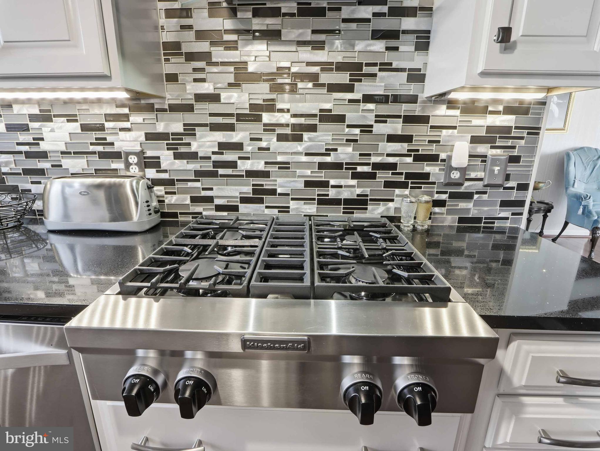 6715 Alter Street Baltimore, MD 21207 - Photo 20 of 47 Kitchen Aid gas cooktop