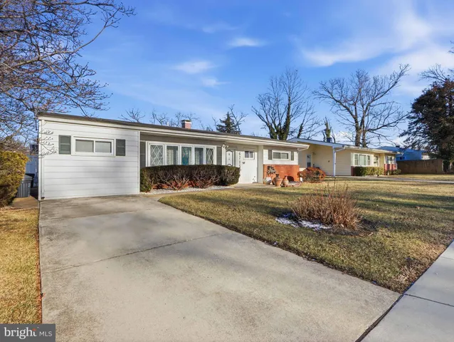 front view of a house with a street