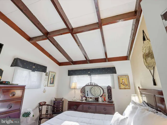 a view of a livingroom with furniture and wooden floor