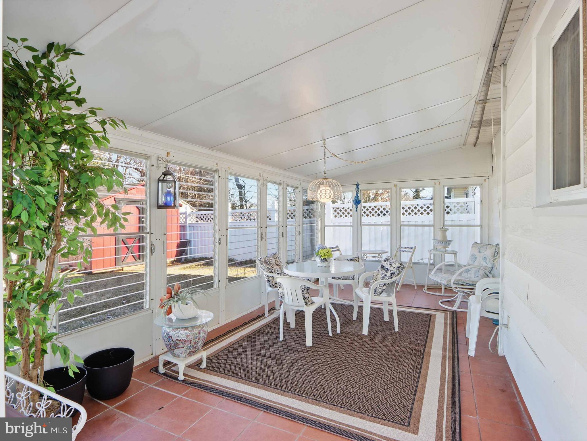 6715 Alter Street Baltimore, MD 21207 - Photo 38 of 47 Ideal place for entertaining in glorious sunroom