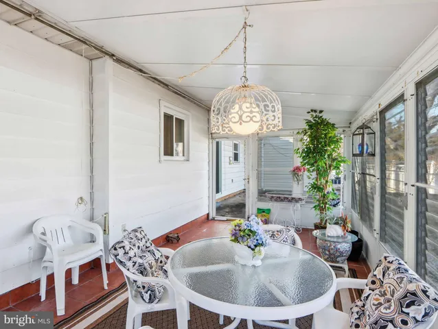 a view of a backyard with large trees