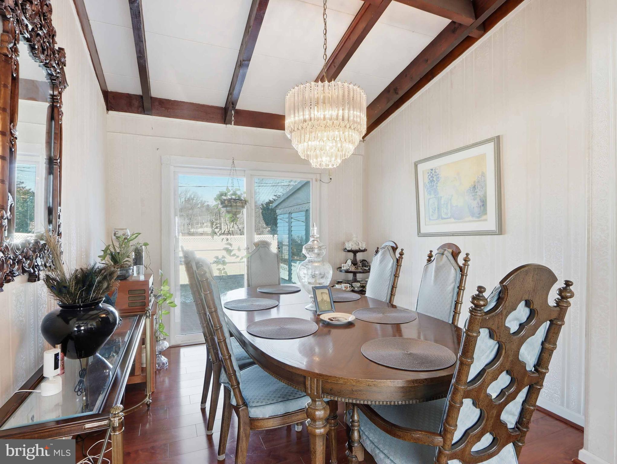 6715 Alter Street Baltimore, MD 21207 - Photo 8 of 47 Soaring ceiling & sliders to rear yard