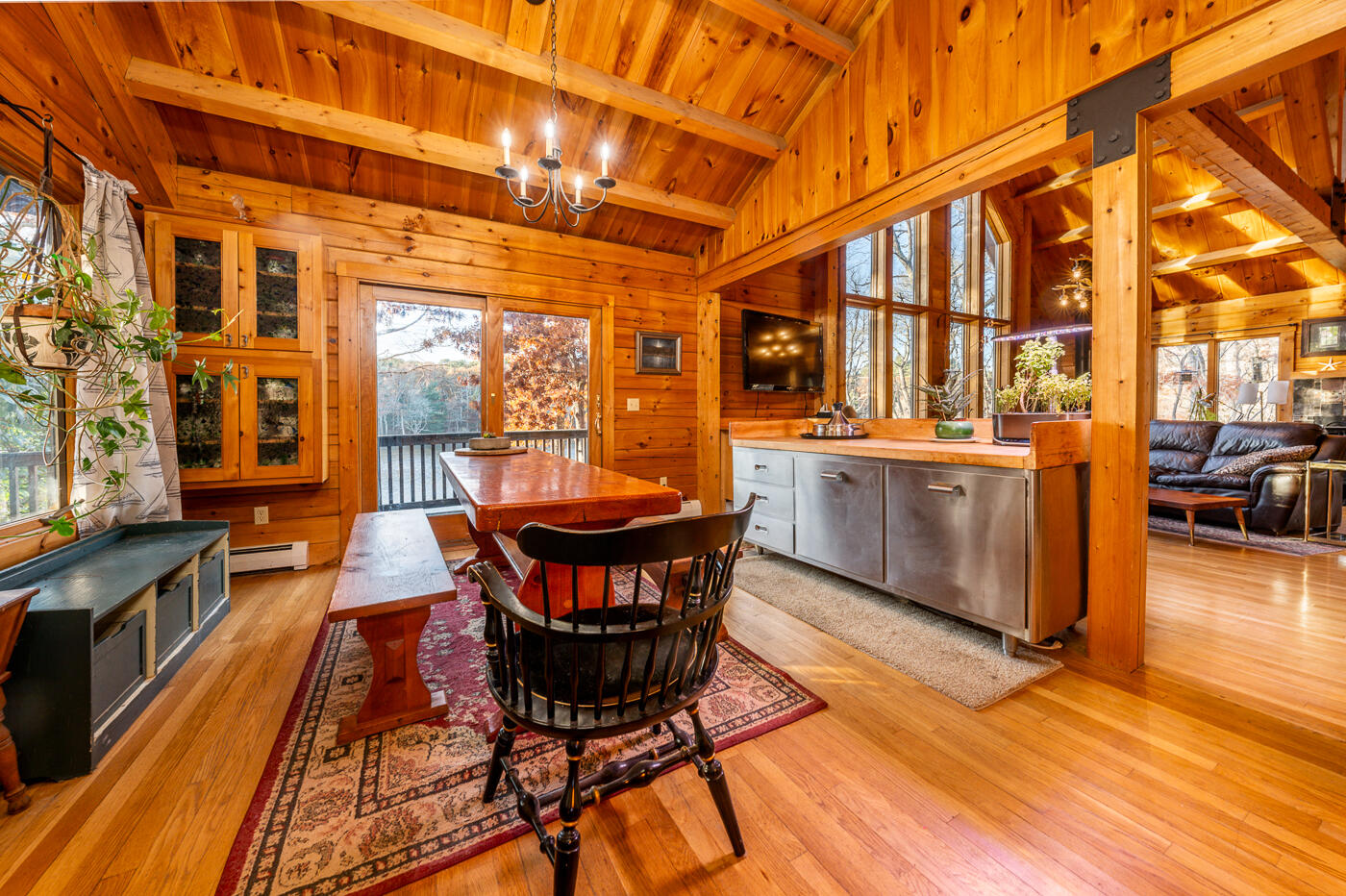119 Valley Bars Road Bourne, MA 02532 - Photo 15 of 46 a view of a patio with table and chairs