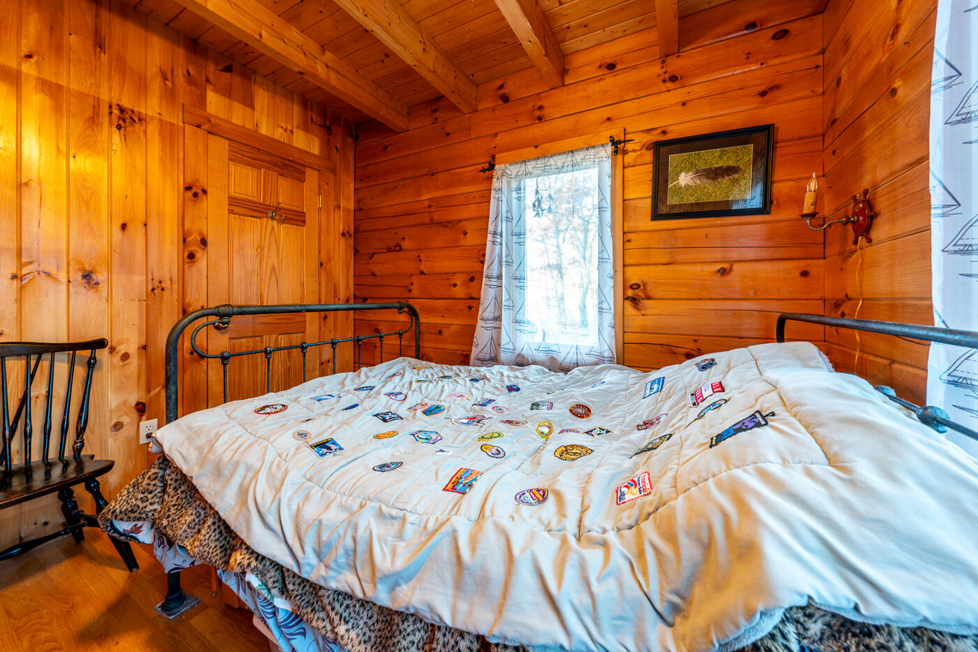 119 Valley Bars Road Bourne, MA 02532 - Photo 20 of 46 a bed sitting in a bedroom next to a bathroom