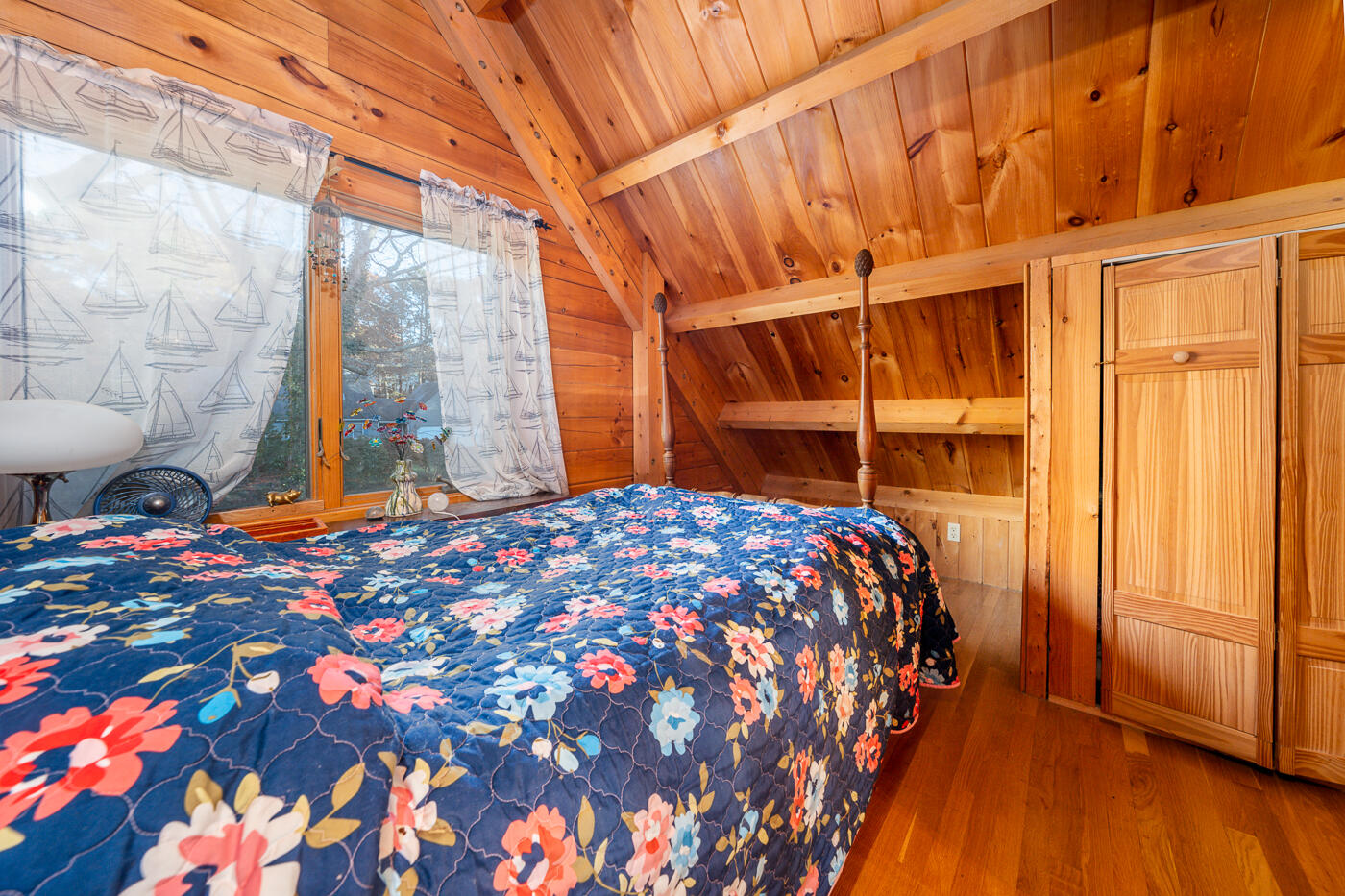 119 Valley Bars Road Bourne, MA 02532 - Photo 24 of 46 a bedroom with a bed and wooden floor