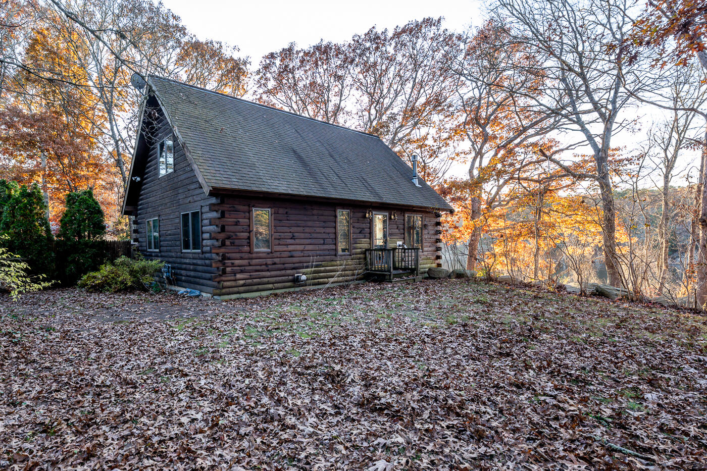 119 Valley Bars Road Bourne, MA 02532 - Photo 40 of 46 a backyard of a house with lots of green space