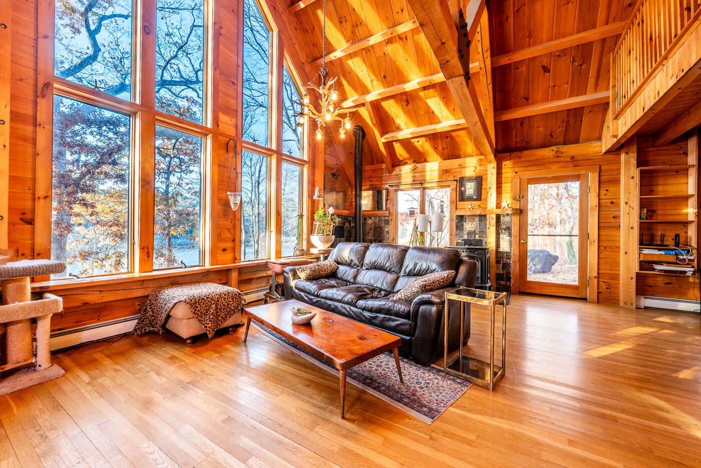 119 Valley Bars Road Bourne, MA 02532 - Photo 5 of 46 a living room with furniture and floor to ceiling windows