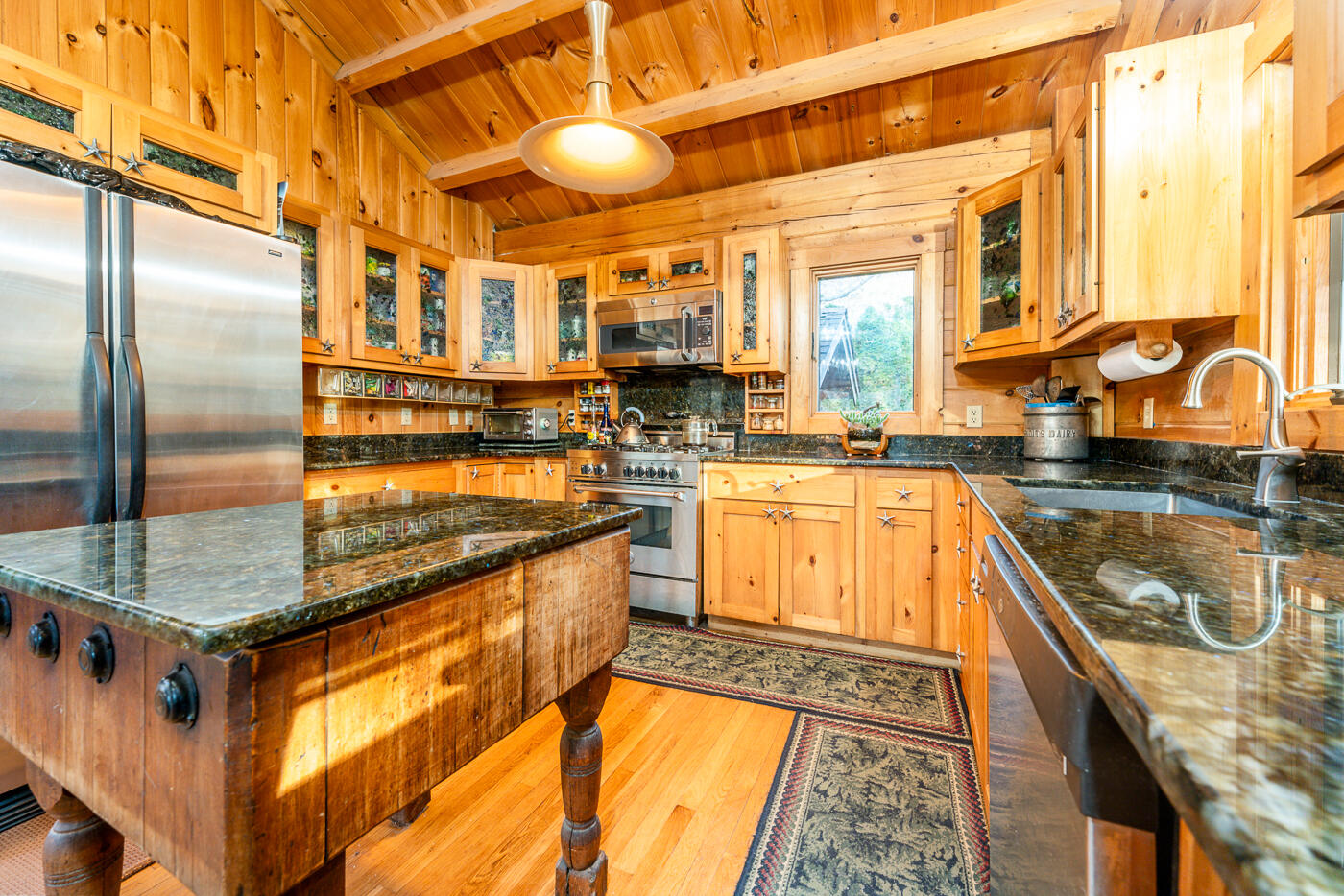 119 Valley Bars Road Bourne, MA 02532 - Photo 9 of 46 a kitchen with stainless steel appliances granite countertop a sink and cabinets