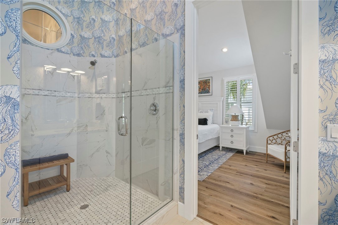 11517 Wightman Lane Captiva, FL 33924 - Photo 19 of 48 a bathroom with a sink and a mirror