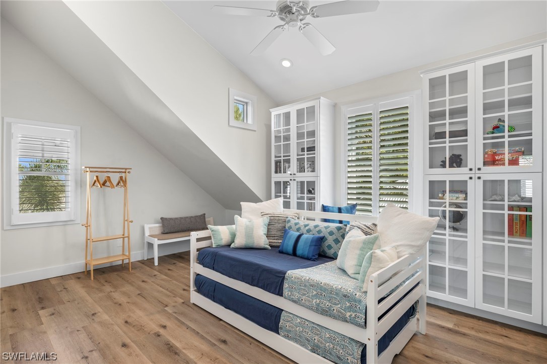 11517 Wightman Lane Captiva, FL 33924 - Photo 20 of 48 a living room with furniture and windows