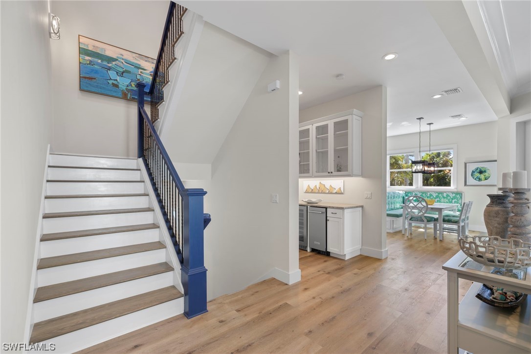 11517 Wightman Lane Captiva, FL 33924 - Photo 23 of 48 a living room with furniture and a wooden floor