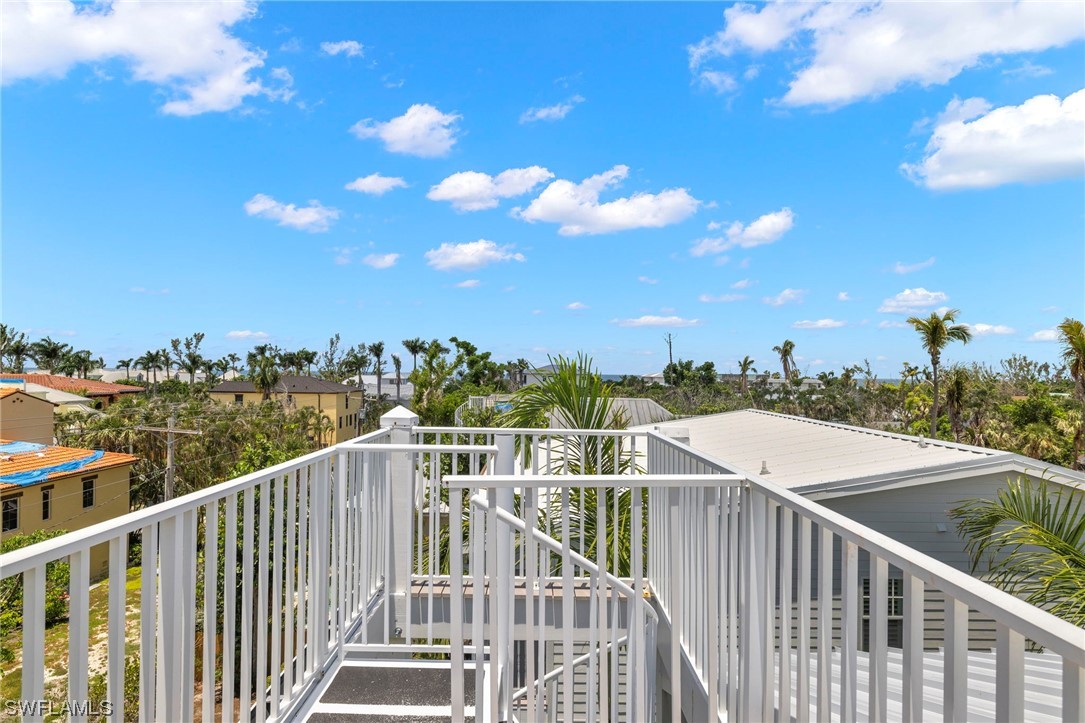 11517 Wightman Lane Captiva, FL 33924 - Photo 43 of 48 a view of a city from a balcony