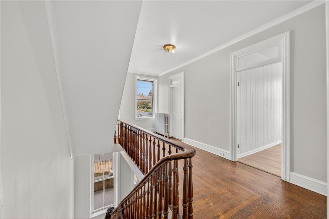 65 2nd Street Slatington, PA 18080 - Photo 26 of 46 Ascend to naturally illuminated spaces on this residence's polished hardwood staircase.