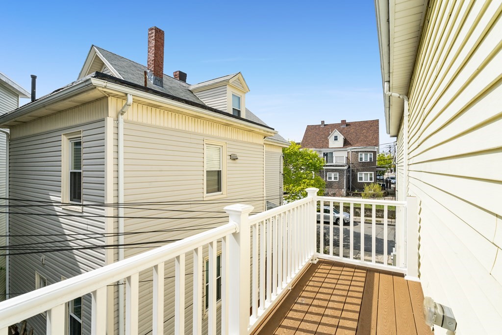 79 Derby Street, Unit 2 Somerville, MA 02145 - Photo 14 of 18 a view of a house with a window