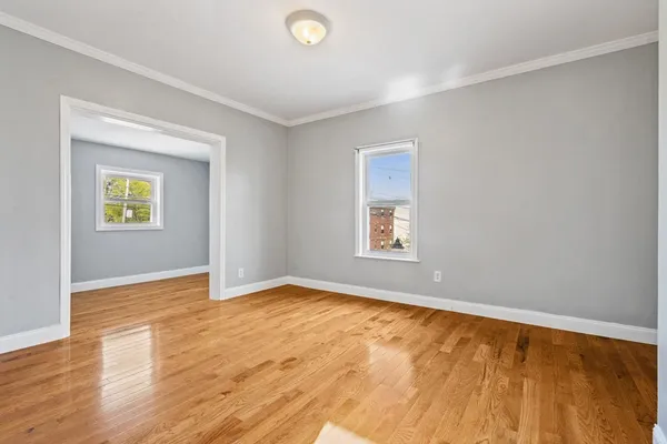 a view of an empty room and window