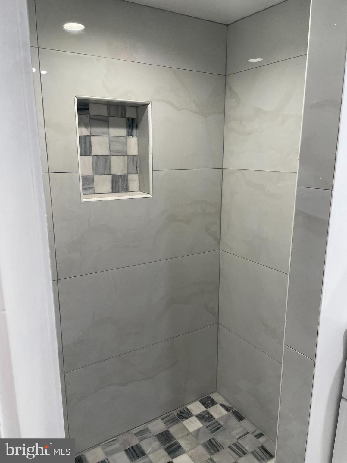 346 Parker Street Chester, PA 19013 - Photo 24 of 32 a bathroom with a shower