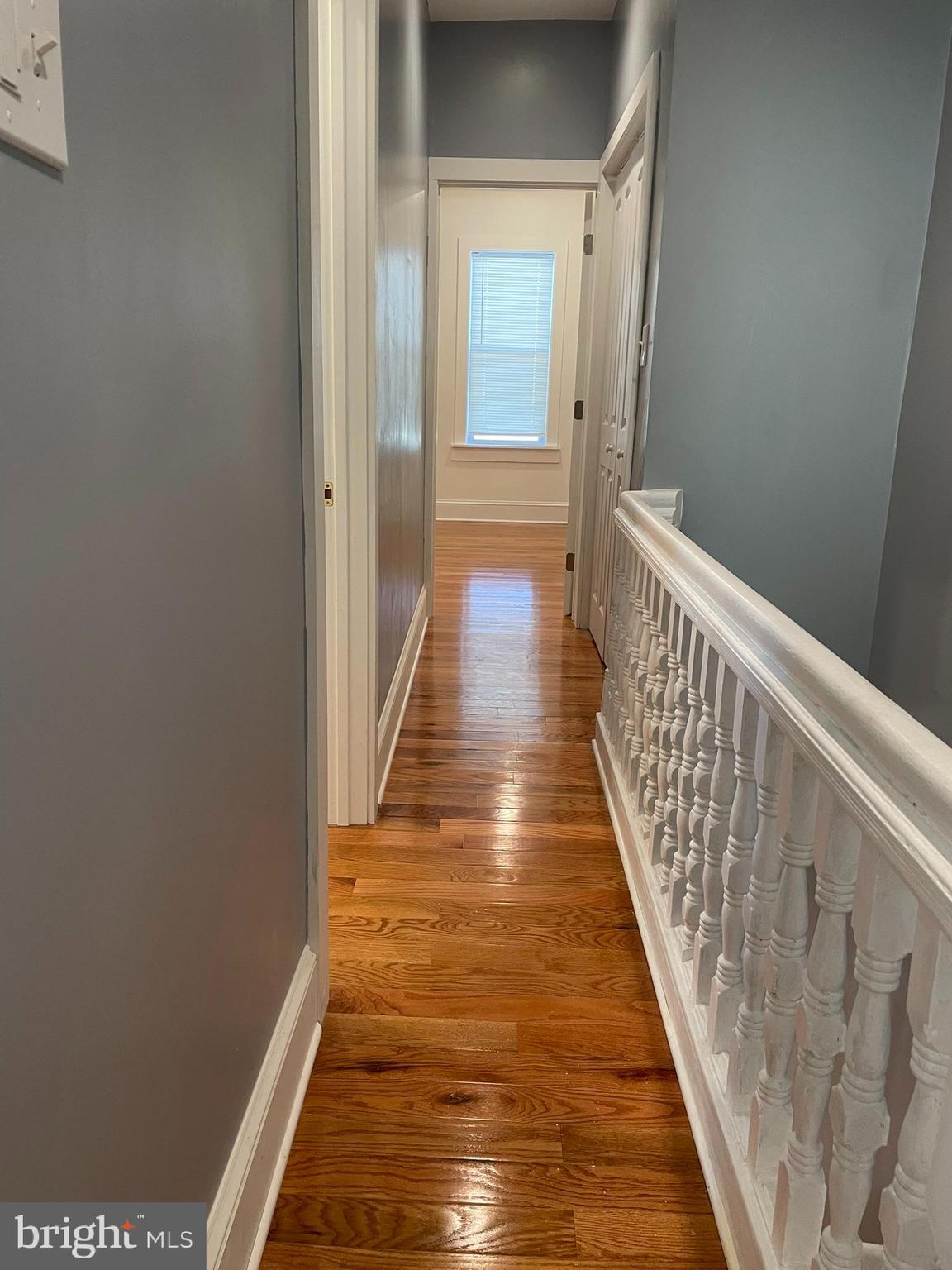 346 Parker Street Chester, PA 19013 - Photo 25 of 32 a view of a hallway with wooden floor