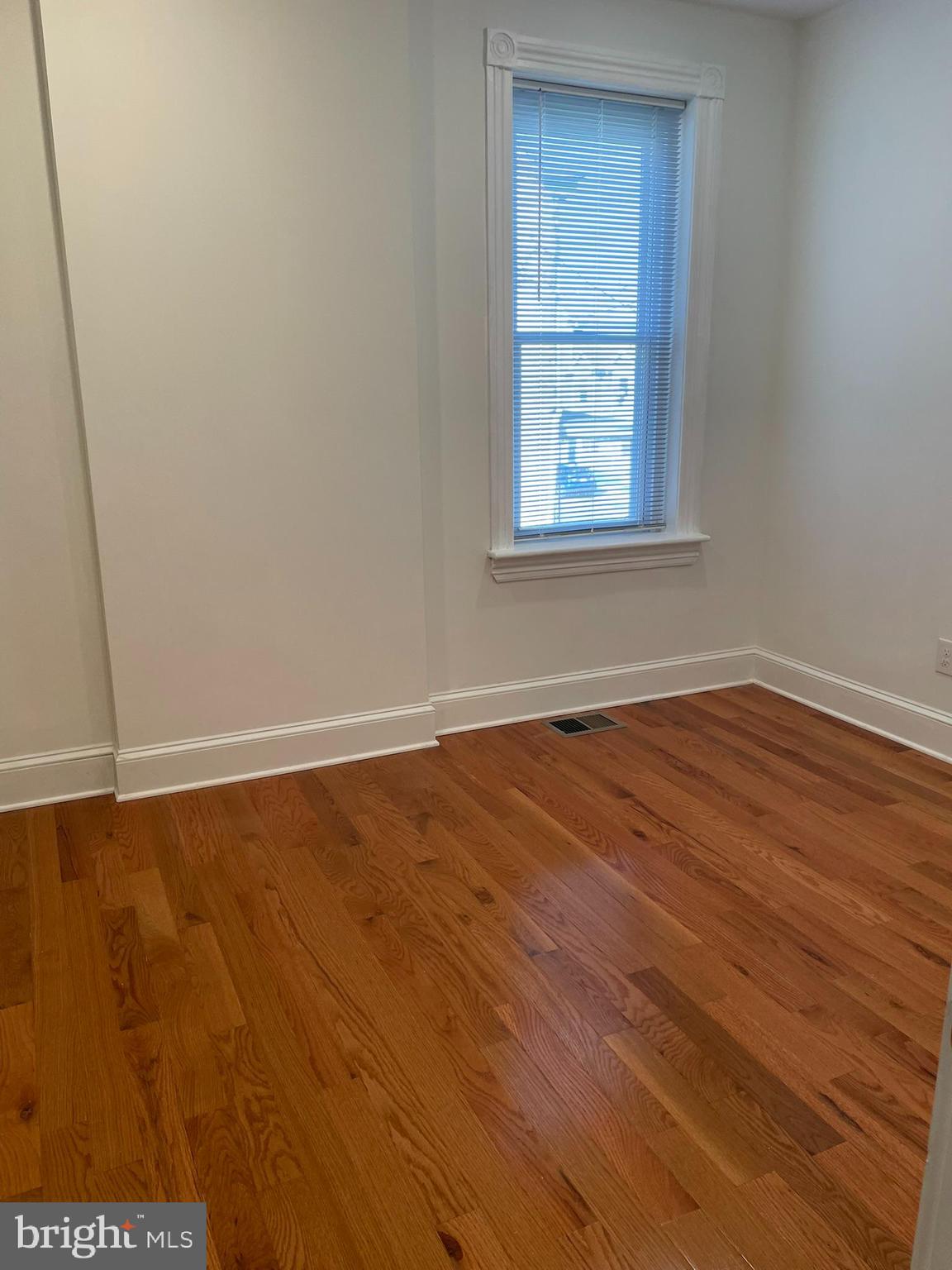 346 Parker Street Chester, PA 19013 - Photo 27 of 32 an empty room with a window
