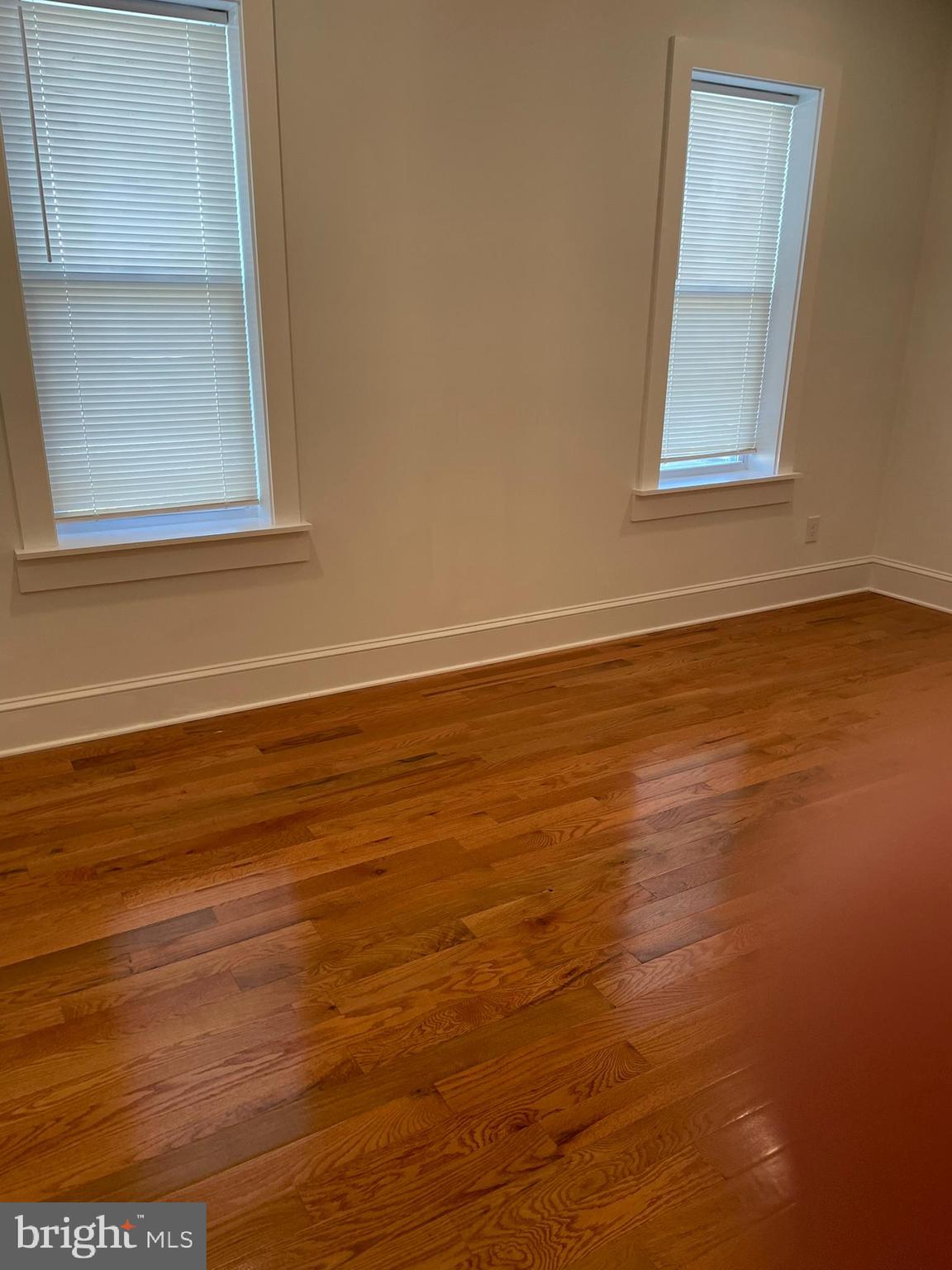 346 Parker Street Chester, PA 19013 - Photo 29 of 32 a view of a small space with wooden floor and a window