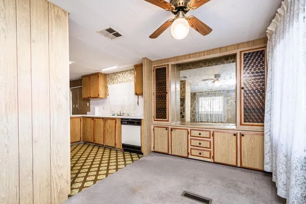 a bathroom with a sink a mirror and a bathtub
